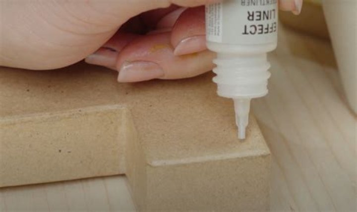 How do you seal acrylic paint on paper?